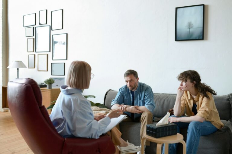 Young couple sitting at psycho session